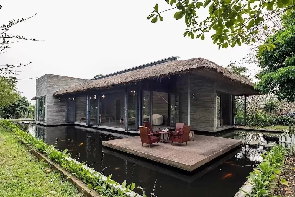 5 Mẫu Nhà Nông Thôn Miền Tây Bến Tre Được Yêu Thích Nhất 2025 7 Mẫu 5 - Nhà sàn ven sông kiểu miền Tây Bến Tre